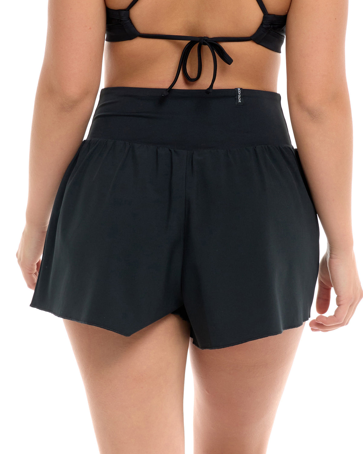 rear view of woman wearing black shorts